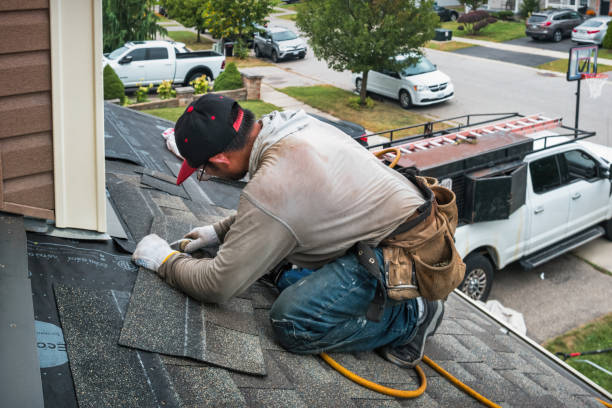 Professional Gutter Repair And Installation technician working in Chepachet, RI